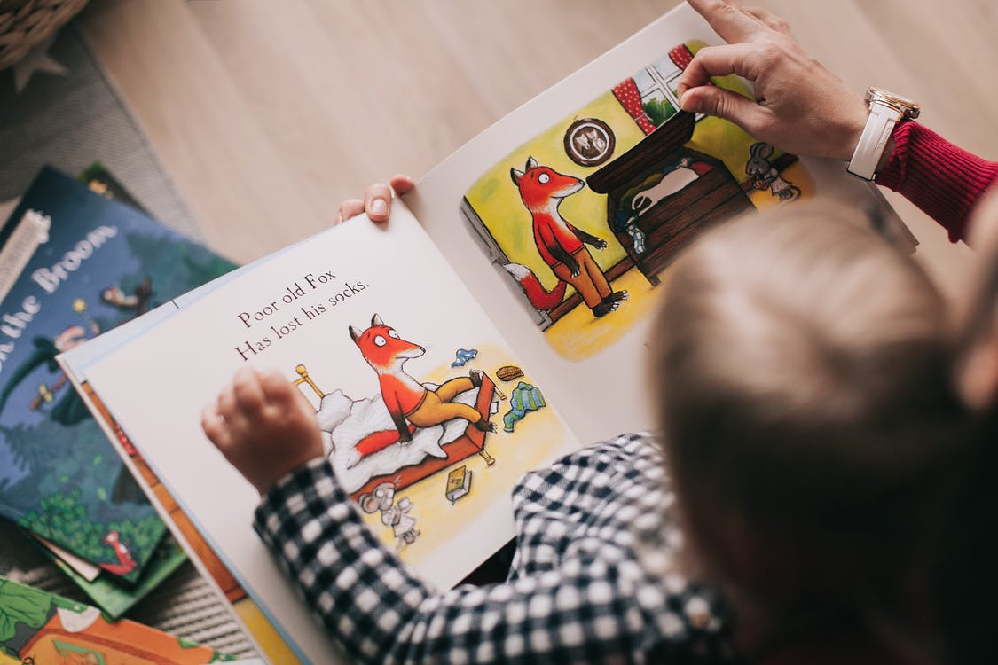 reading picture book to child