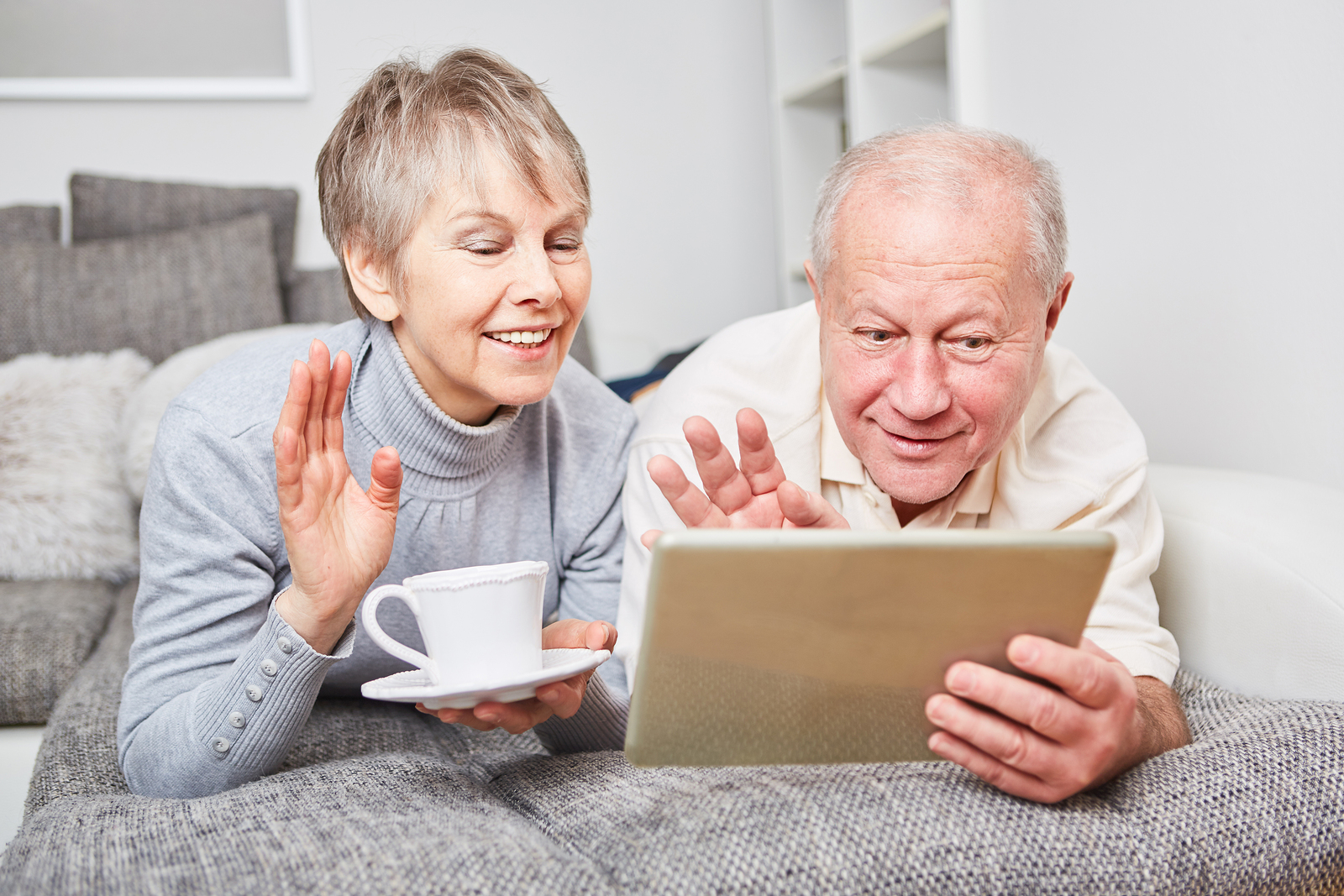 grandparents using tablet device