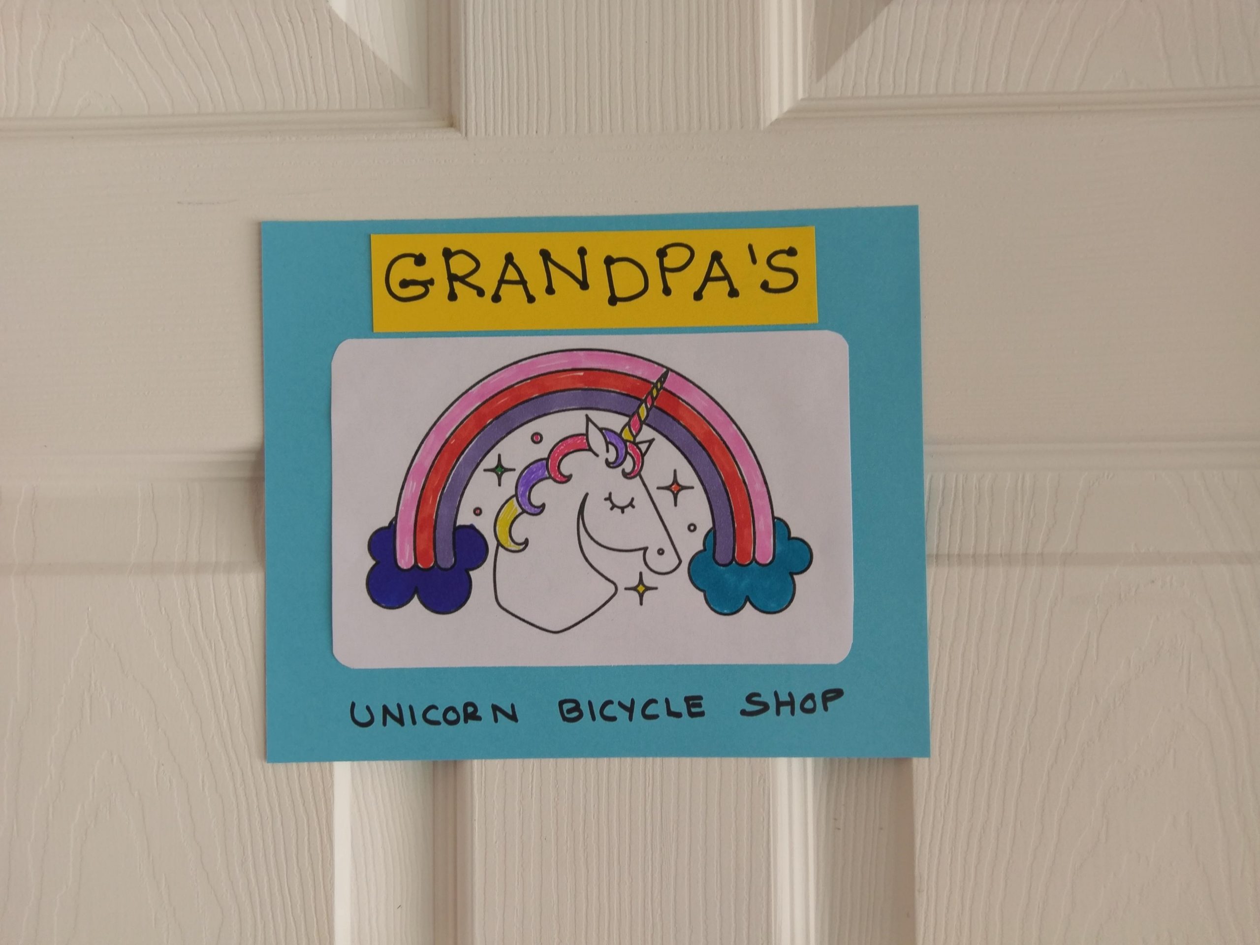 Sign for Grandpa's Unicorn Bicycle Shop